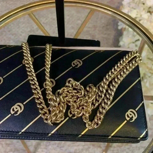 Gucci mini leather chain bag with double G stripe in black and gold. - Picture 8 of 14